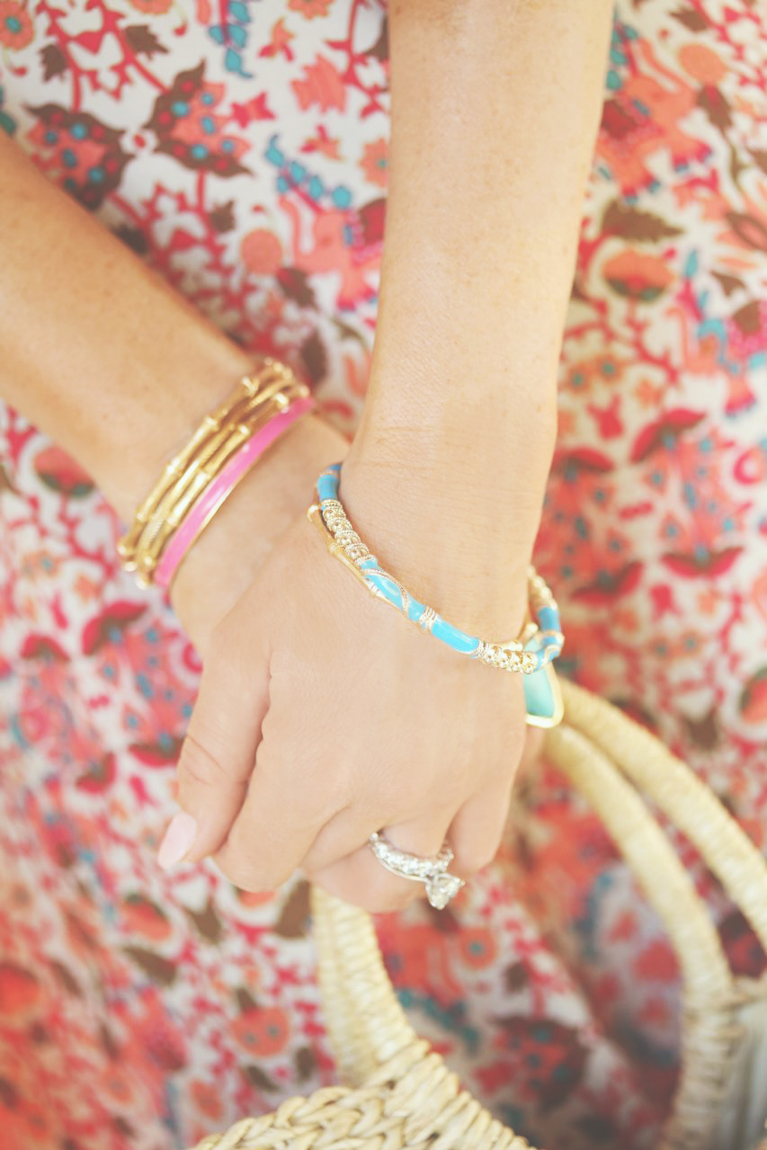 Enamel bracelets and straw tote